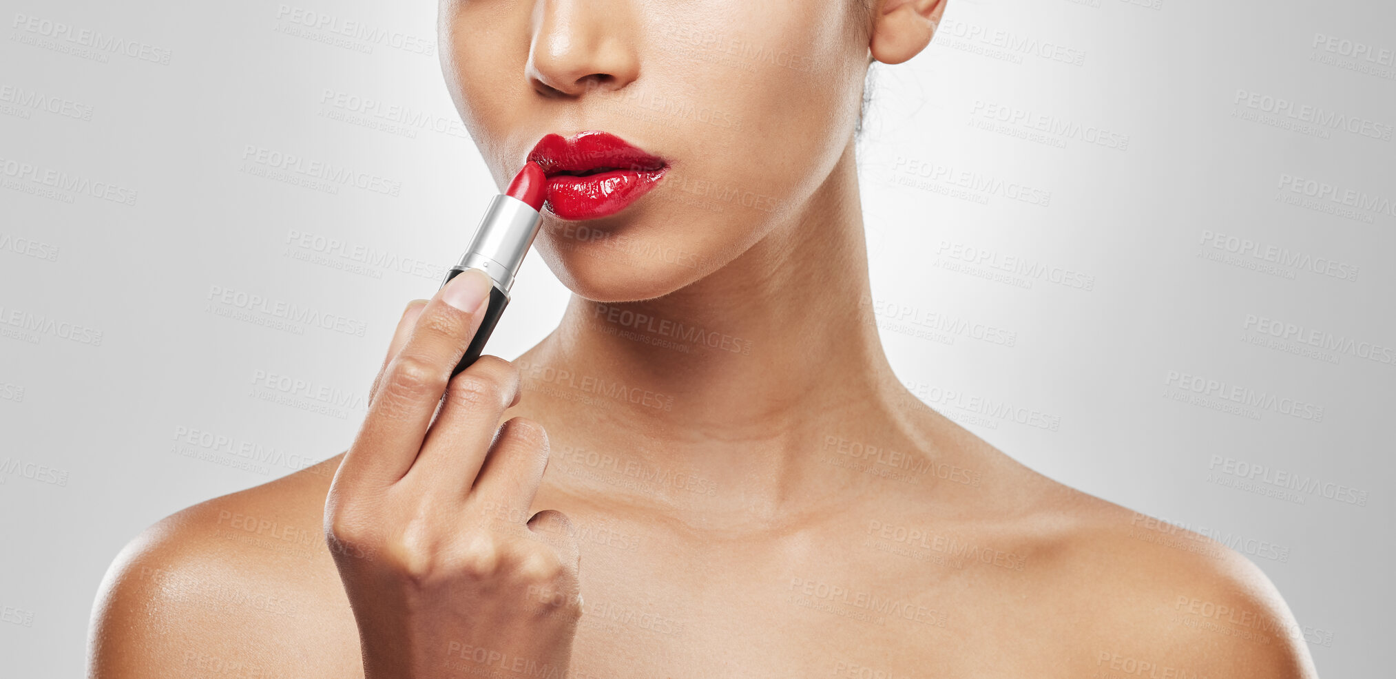 Buy stock photo Lipstick, mouth and woman in studio with makeup, beauty and aesthetic with color and shine. Cosmetology, self care and person with cosmetics for pigment, glow and wellness on white background