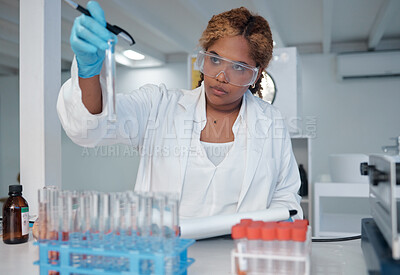 Buy stock photo Scientist, test tube and science in lab for innovation, biotechnology or monkeypox vaccine development. Black woman, healthcare and chemistry study for stem cell, genes editing or microbiome research