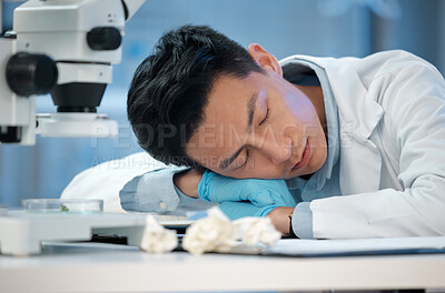 Buy stock photo Sleeping, science and man in lab, research and experiment with burnout, exhausted and overworked. Asian person, medical and professional in workplace, nap and fatigue with waiting for test results