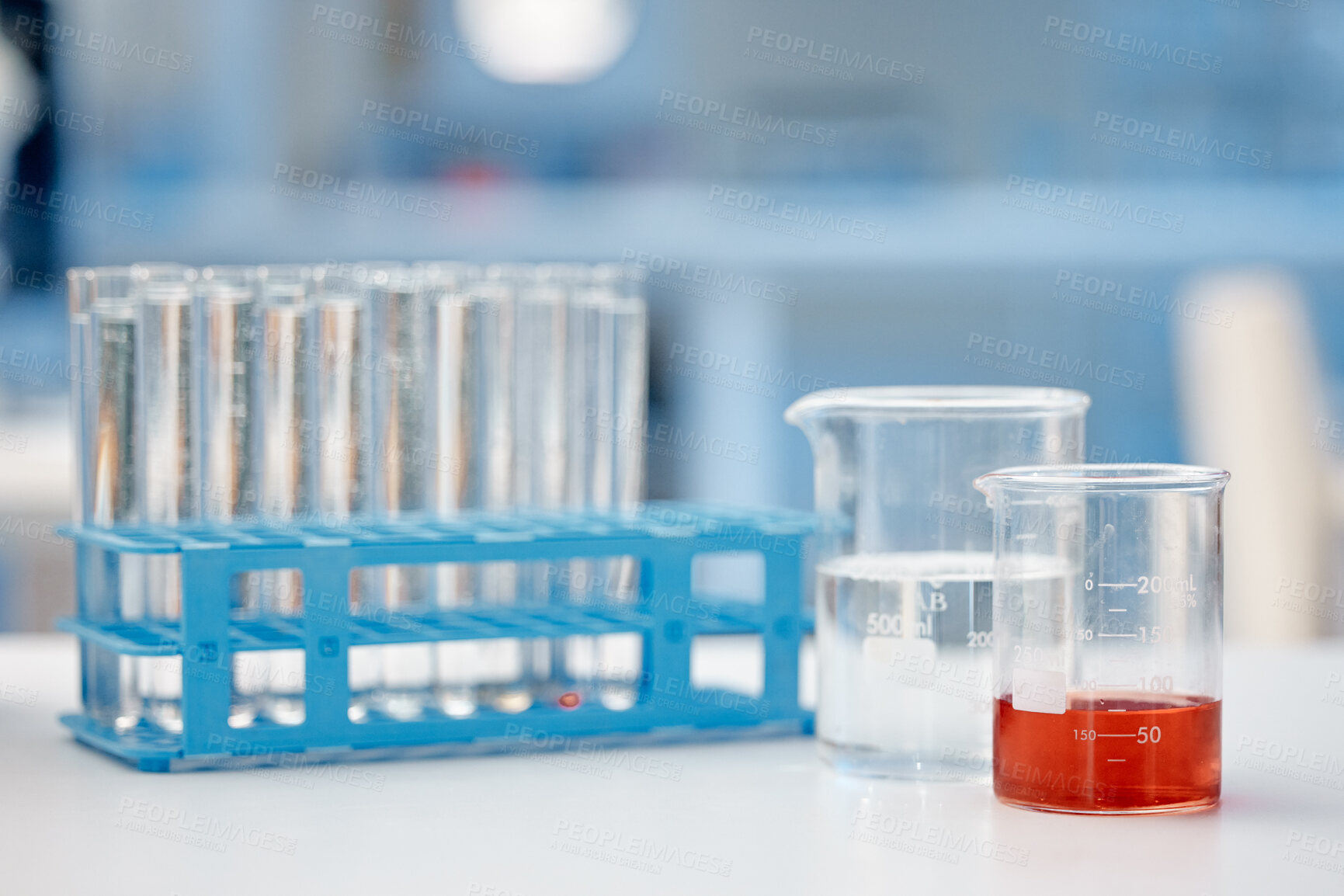 Buy stock photo Science, test tubes and beaker on table in lab for medical research, pharmaceutical experiment and treatment. Fluid container, liquid and equipment for chemical development or chemistry investigation