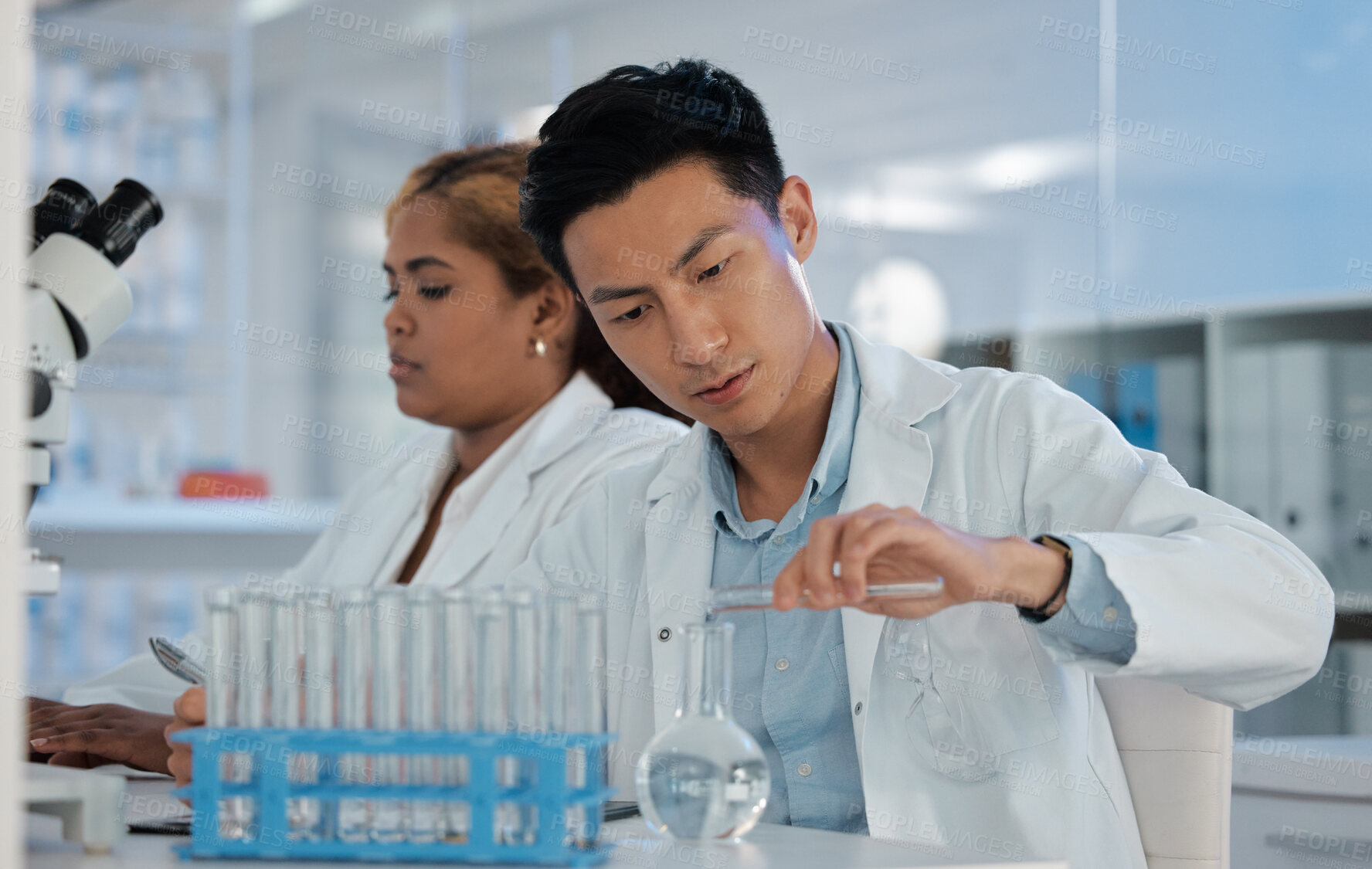 Buy stock photo People, scientist and chemical in beaker at laboratory for scientific research, experiment and investigation. Test tube, healthcare and liquid on glass for antiviral compound with clinical trial