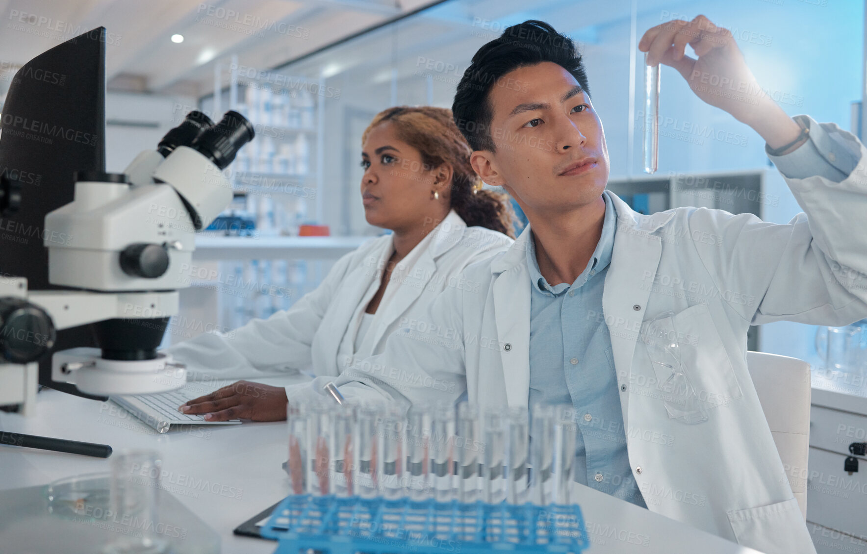 Buy stock photo Sample analysis, science and scientist in a lab for research, chemistry test and chemical work. Futuristic, physics and a male laboratory technician with liquid for pharmaceutical exam and innovation