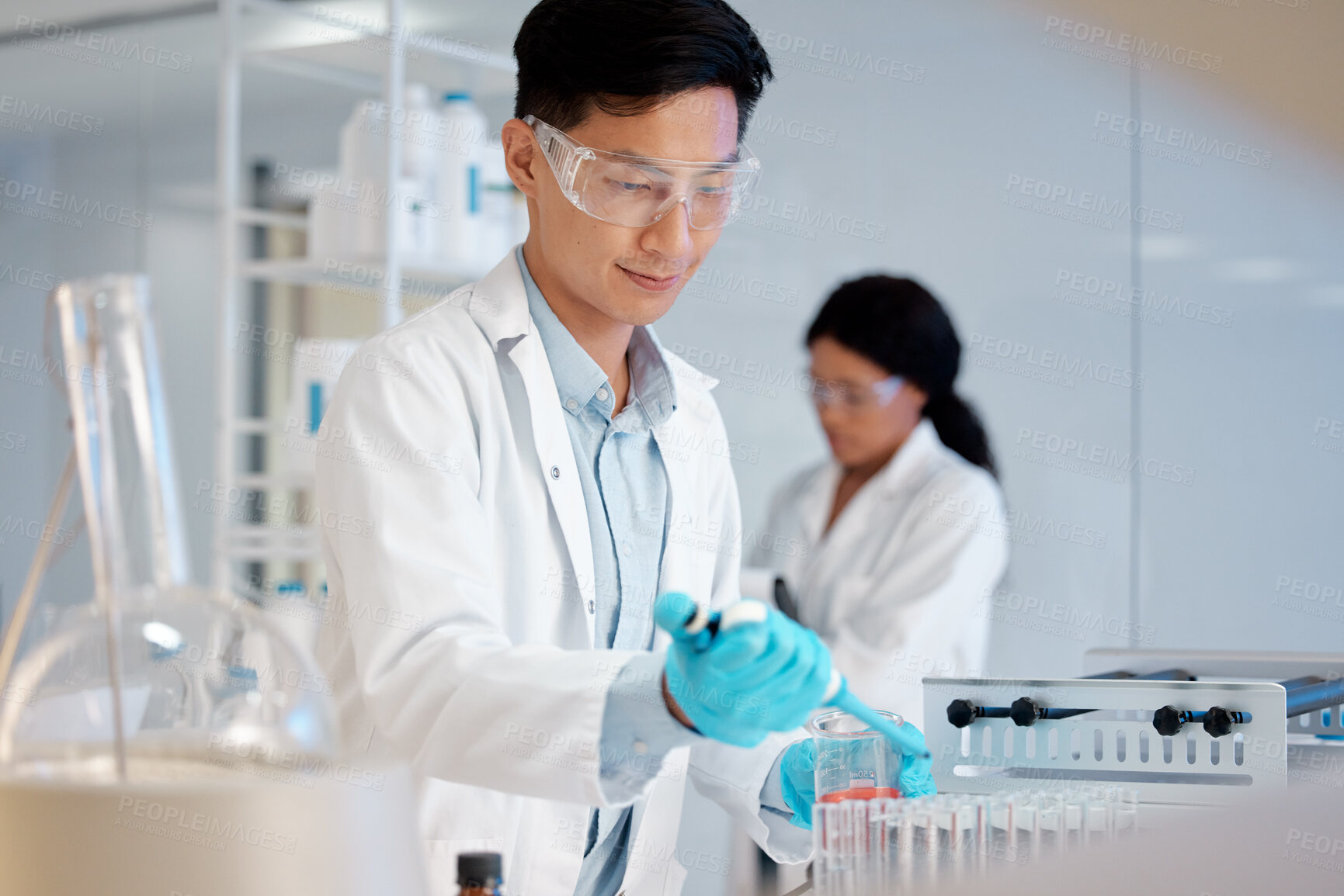 Buy stock photo Scientist, test tube and pipette in lab for experiment, biotechnology or monkeypox vaccine development. People, healthcare and chemistry for stem cell, genes editing or microbiome innovation research