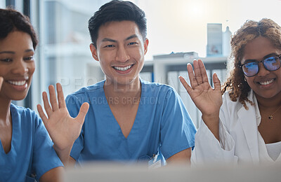 Buy stock photo Cropped shot of a group of medical professionals waving to a laptop during an online meeting in the hospital boardroom