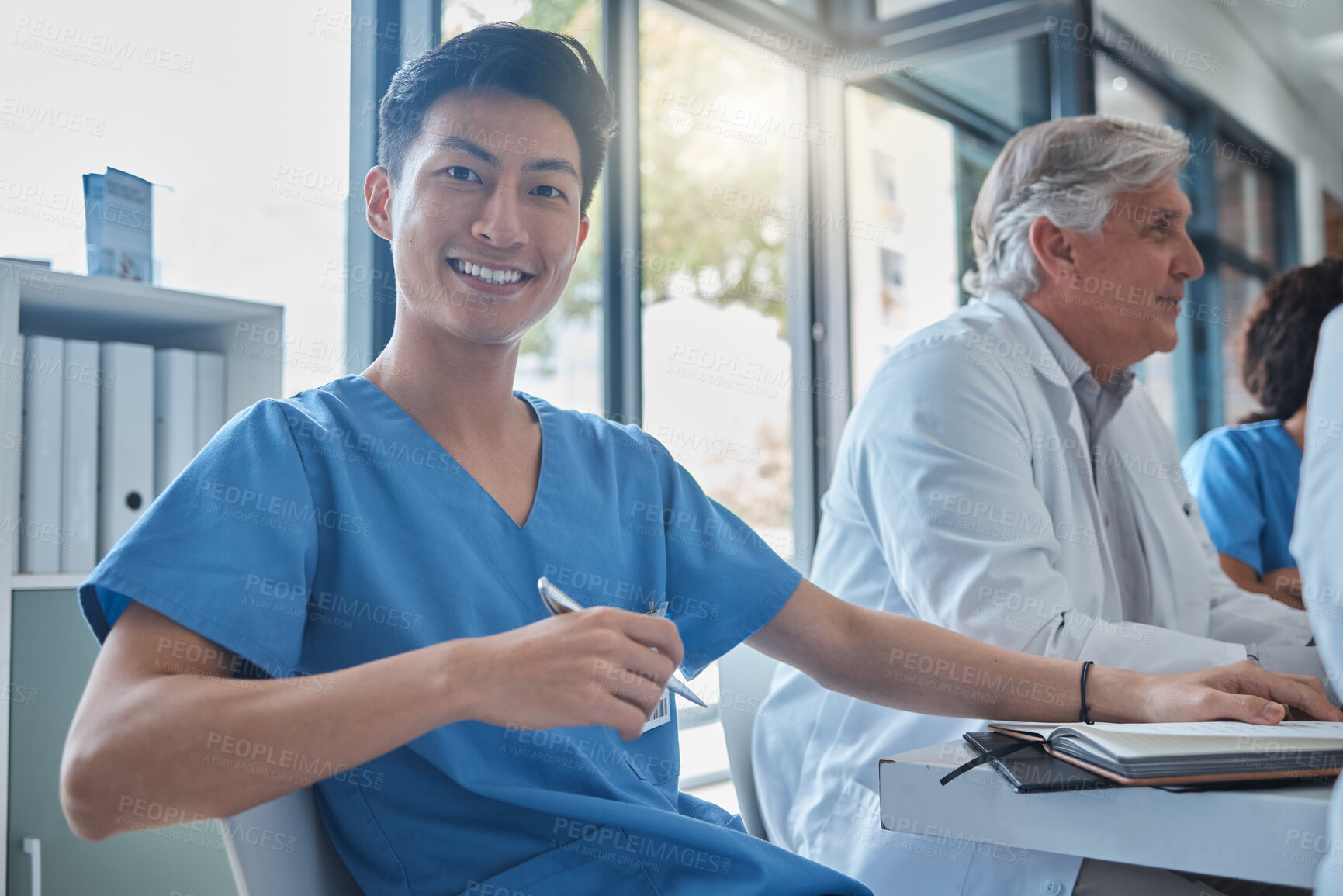 Buy stock photo Medicine, team and man with portrait in meeting for healthcare planning, health management or discussion. Doctor, nurse collaboration and people in boardroom for diagnosis treatment and cardiology