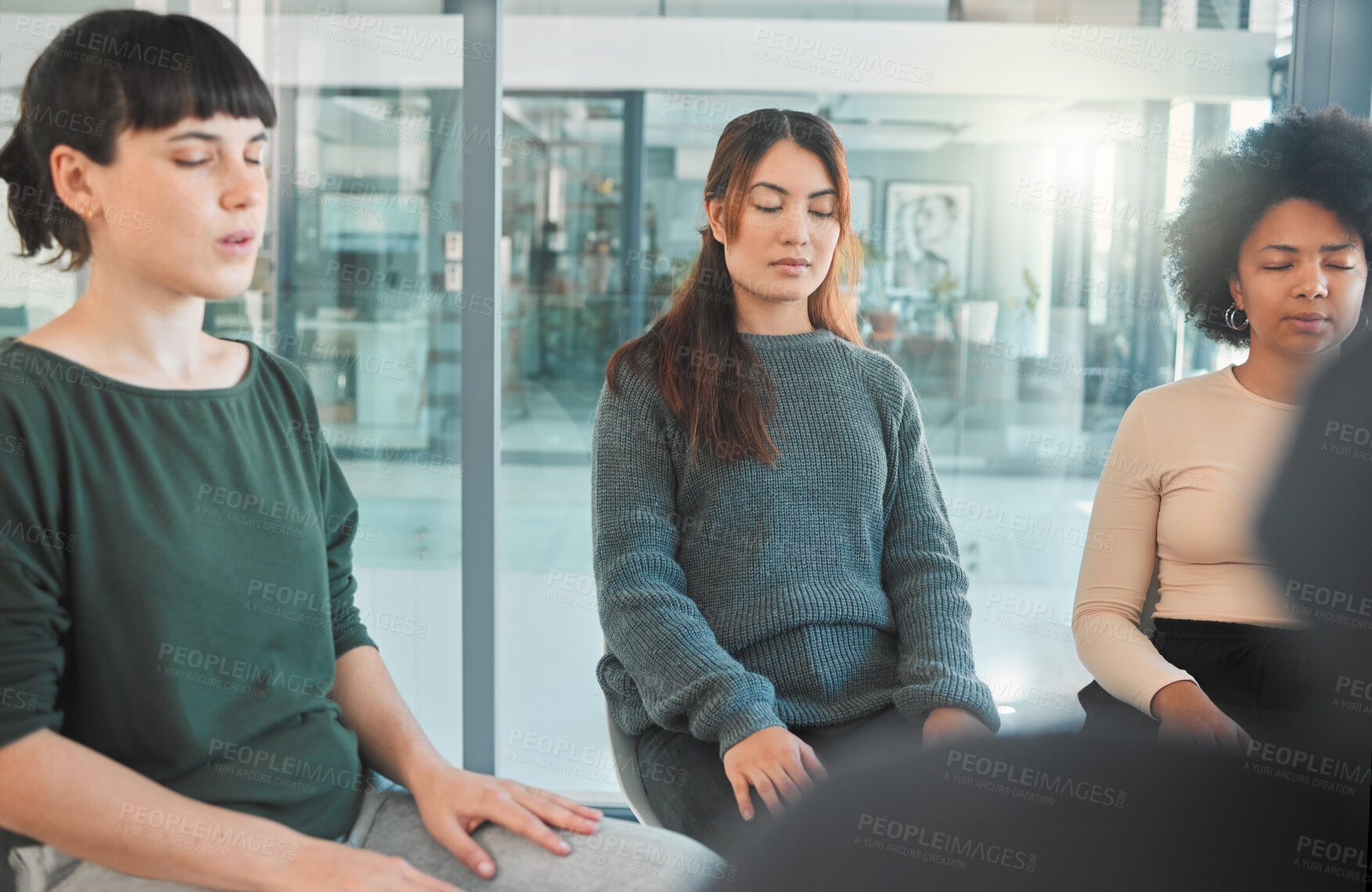 Buy stock photo Shot of a group of people attending a therapy session