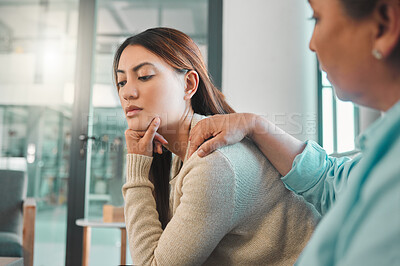 Buy stock photo Shot of a young woman looking contemplative during a consultation with her psychologist