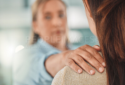 Buy stock photo Shot of a therapist putting her hand on her patient's shoulder