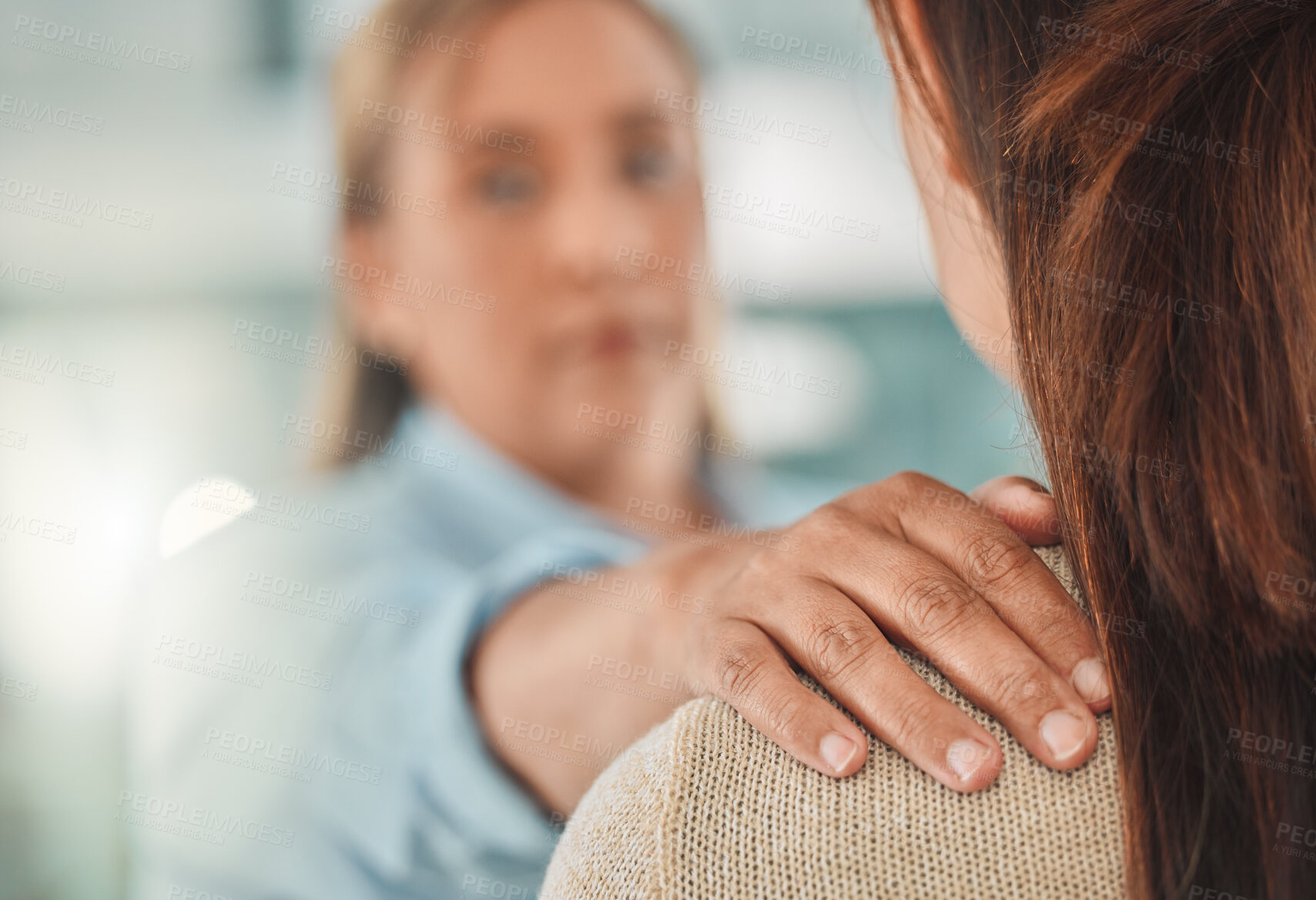 Buy stock photo Shot of a therapist putting her hand on her patient's shoulder