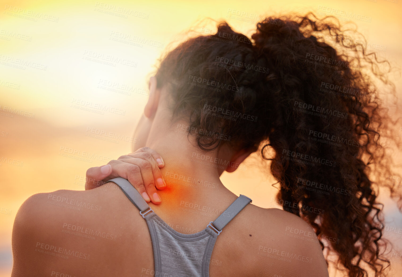 Buy stock photo Woman, fitness or back injury with red glow on beach sunset for accident, pain or muscle tension. Female person, athlete or runner with sore spine, inflammation or ache for sprain, pressure or strain