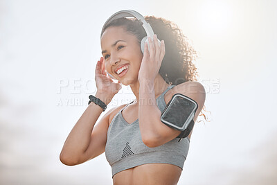 Buy stock photo Headphones, fitness and woman in nature for exercise, marathon training and cardio workout. Sports, happy and person outdoors listening to music, audio and podcast for wellness, health and running