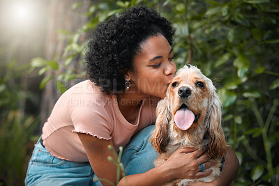 Buy stock photo Woman, cocker spaniel puppy and kiss in park with smile, hug and care on ground in summer. Girl, dog mom and happy for embrace with pet, animal or connection with love on path with sunshine in nature