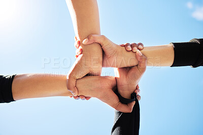 Buy stock photo Below, hands and team in nature for support, strength and unity for synergy. Teamwork, huddle or people connected for power, solidarity or trust in community for collaboration, union or organization