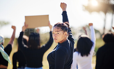 Buy stock photo Protest, portrait and woman with fist for climate change, global warming or rally in park. Nature, demonstration and girl with group for call to action, pollution crisis or protect environment