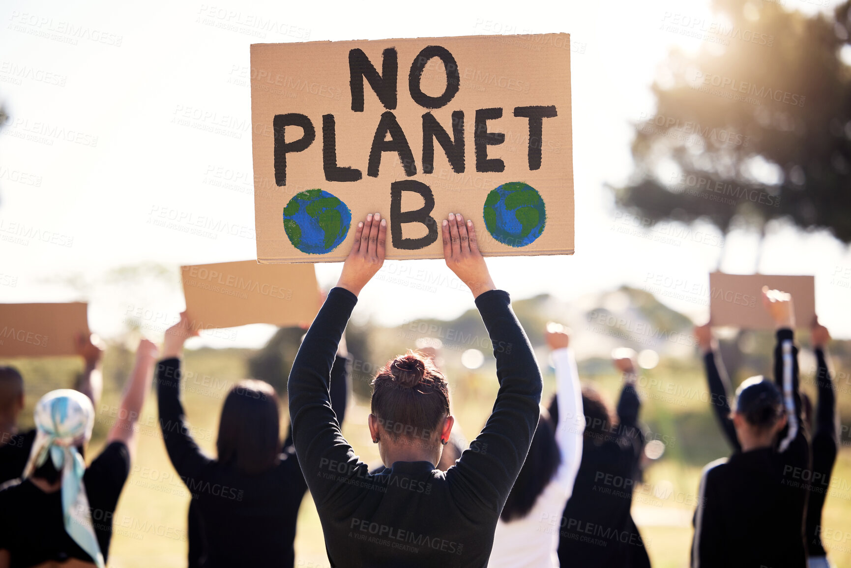 Buy stock photo Protest, climate change and sign with a group of people outdoor at a rally or march for conservation. Global warming, poster and environment with a crowd walking together during a community strike