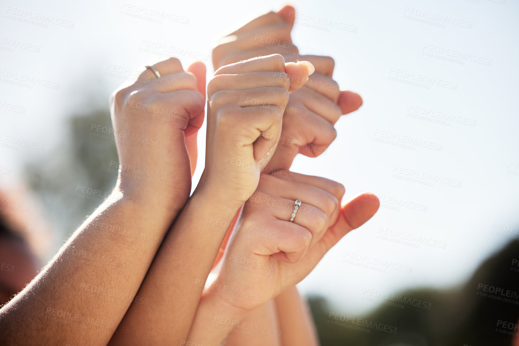 Buy stock photo Fists together, solidarity and diversity with unity as university students or colleagues for movement. Group of people, synergy and community for empowerment and collaboration for protest or activism