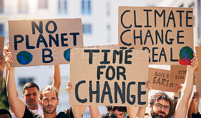 Buy stock photo Group, poster and together in street for planet, climate change and sustainable future in city. People, cardboard sign and activism for change, sustainability or justice for environment in metro road