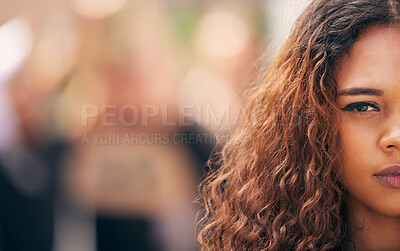 Buy stock photo Shot of a young female protestor at a rally