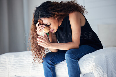 Buy stock photo Depression, tears and woman with teddy bear in bedroom for grief, miscarriage or mourning death of kid. Sad mother, crying and person with pain, anxiety or trauma problem, stress or frustrated on bed