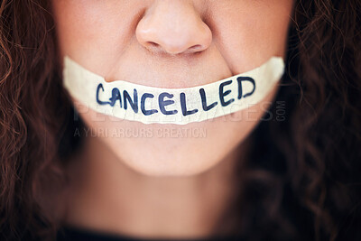 Buy stock photo Political, protest and closeup with tape on a mouth for justice, freedom or revolution movement. Bullying, violence and zoom of a woman with cancelled on lips for feminism, activism or discrimination
