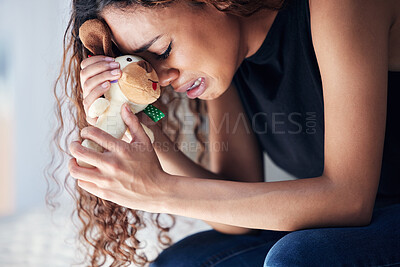 Buy stock photo Depression, tears and woman with teddy bear in home for grief, miscarriage or mourning death of kid. Sad mother, crying and person with pain, anxiety or trauma problem, stress or frustrated in house