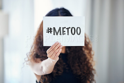 Buy stock photo Shot of an unrecognisable woman holding a poster with the hashtag 