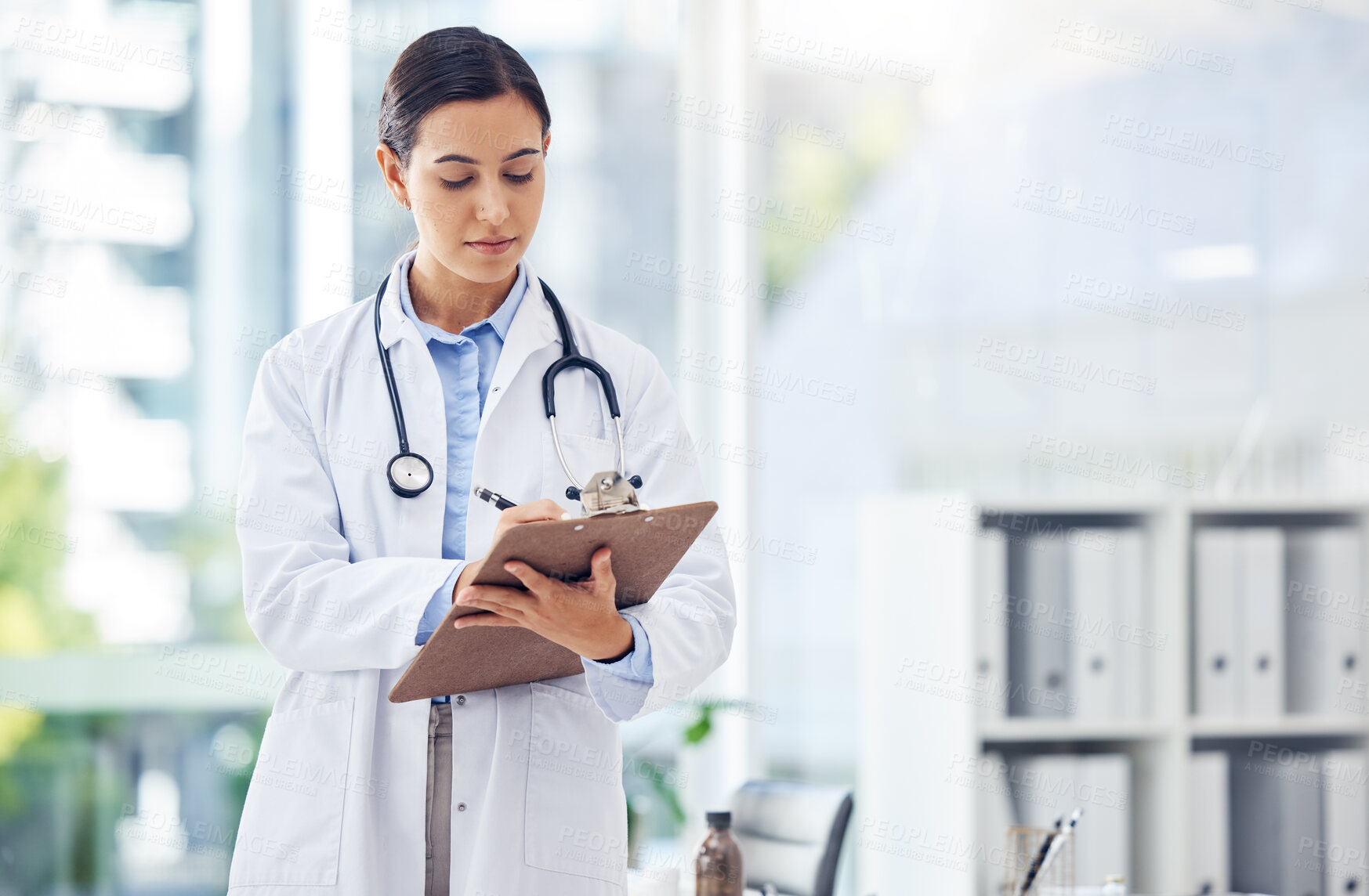 Buy stock photo Woman, doctor and writing with clipboard for diagnosis, medical study or research at hospital. Female person or healthcare employee taking notes for discovery, information or prescription at clinic