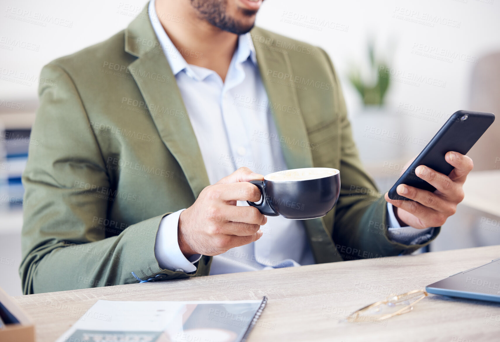 Buy stock photo Coffee cup, phone and hand of man in office checking email, online chat or business schedule. Advisor, consultant or businessman with drink, smartphone and scroll on mobile app for networking at desk