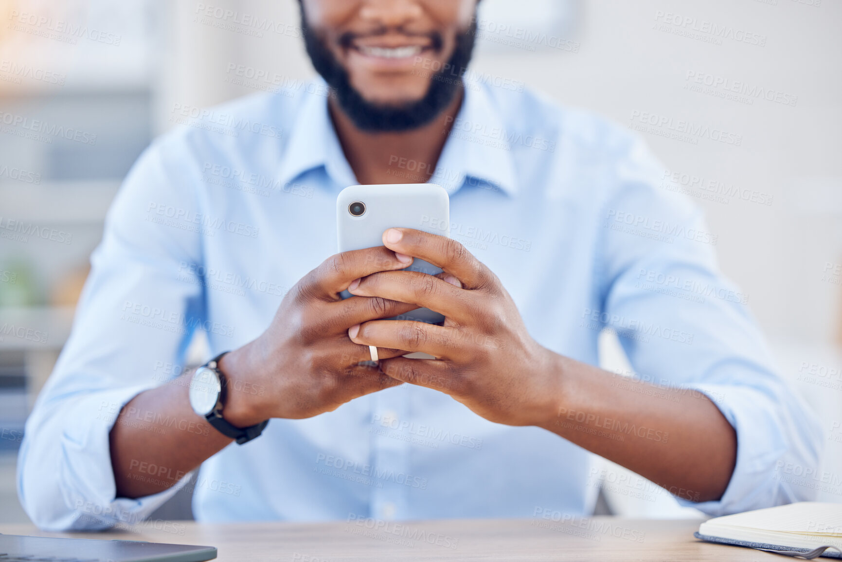 Buy stock photo Shot of an unrecognizable businessperson using a phone at work