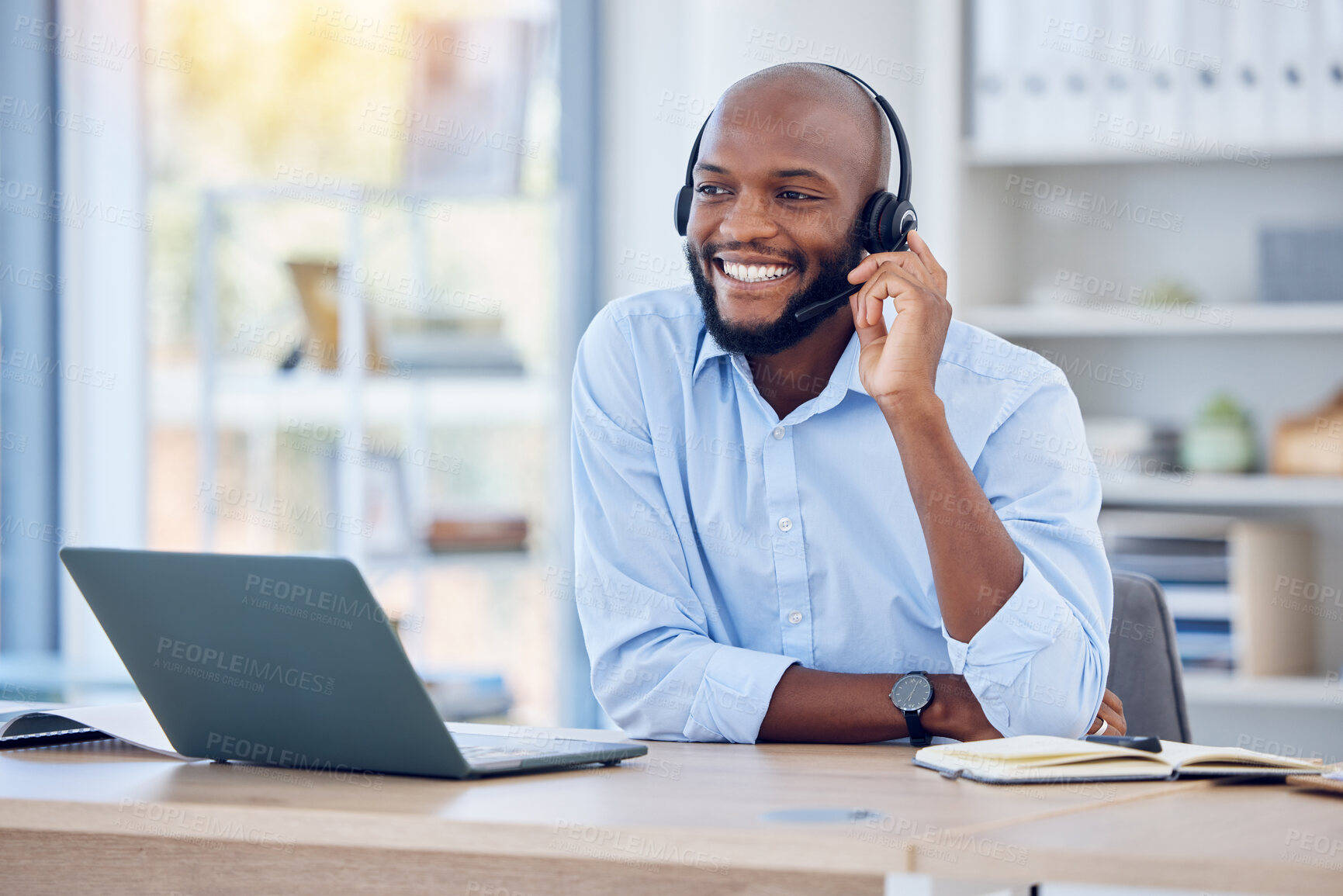 Buy stock photo Happy black man, callcenter with phone call and contact us, communication with headset and CRM. Male consultant with smile, customer service or telemarketing with conversation and help desk employee