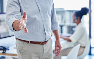 Buy stock photo Closeup shot of an unrecognisable businessman extending a handshake in an office