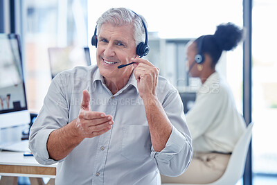 Buy stock photo Portrait of a mature call centre agent extending a handshake in an office