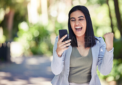 Buy stock photo Happy, woman and phone with celebration in park for good news, notification and positive feedback. Nature, excited and fist of person with gesture for career success, bonus and email of job promotion