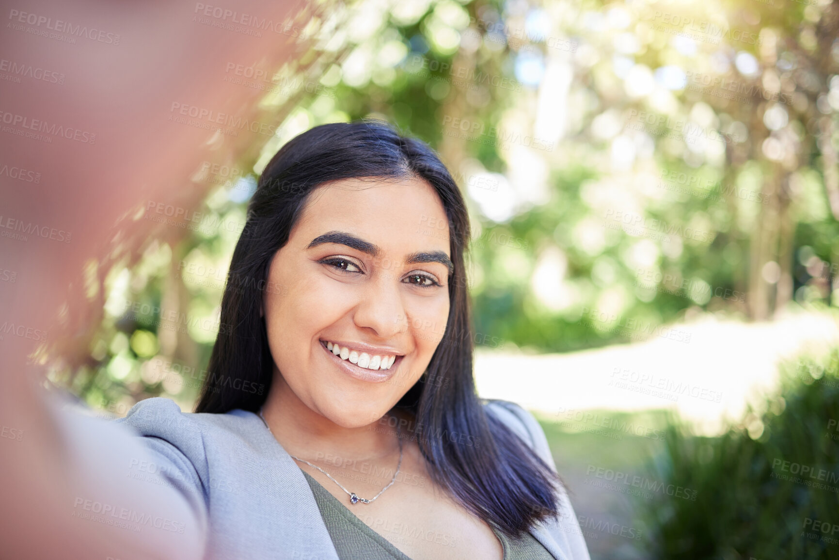 Buy stock photo Business woman, selfie and smile in park with portrait, memory and outdoor in sunshine for post on social media. Person, happy and face in nature with photography for profile picture in Colombia