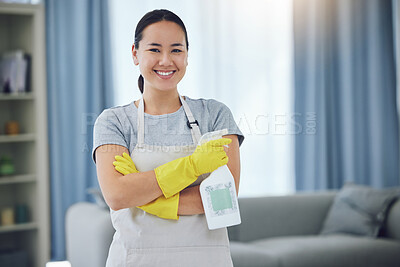 Buy stock photo Portrait, detergent and woman with arms crossed in living room for cleaning, remove dirt or disinfection. Germs, gloves and hispanic maid with apron for housekeeping, service or sanitize in home