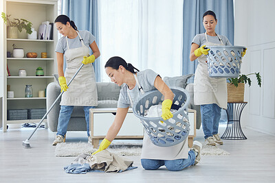 Buy stock photo Laundry, cleaning and series of woman with basket in home for multitasking, housekeeping and housework. Living room, apartment and person with clothing for maid service, hygiene and maintenance