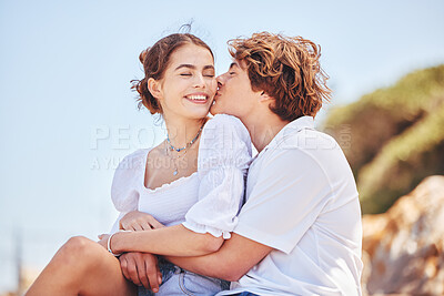 Buy stock photo Happy, love and couple at beach kiss for bonding, loving relationship and together by ocean. Dating, travel and man and woman embrace for affection, relax and romance on holiday, vacation and weekend