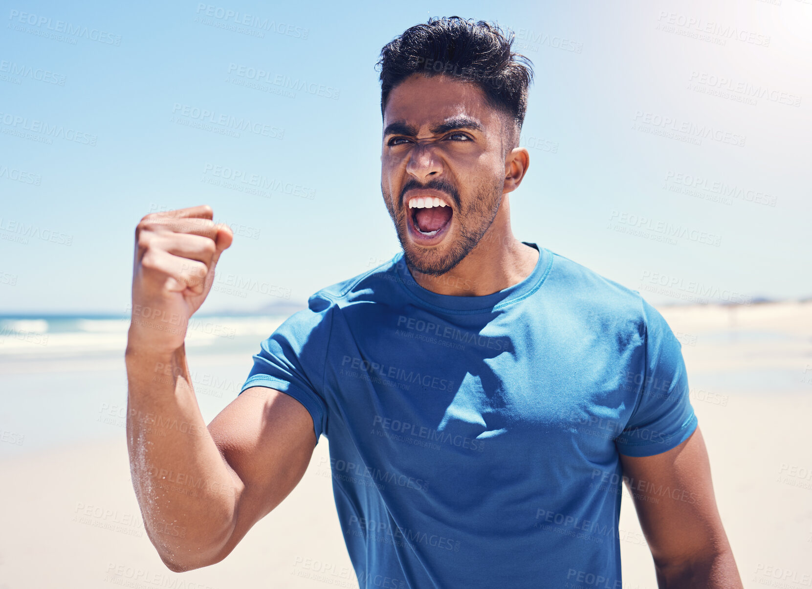 Buy stock photo Beach, man and fist with celebration for fitness or running with achievement and victory in India. Male person, success with exercise, workout and training for health, wellness and self care in ocean