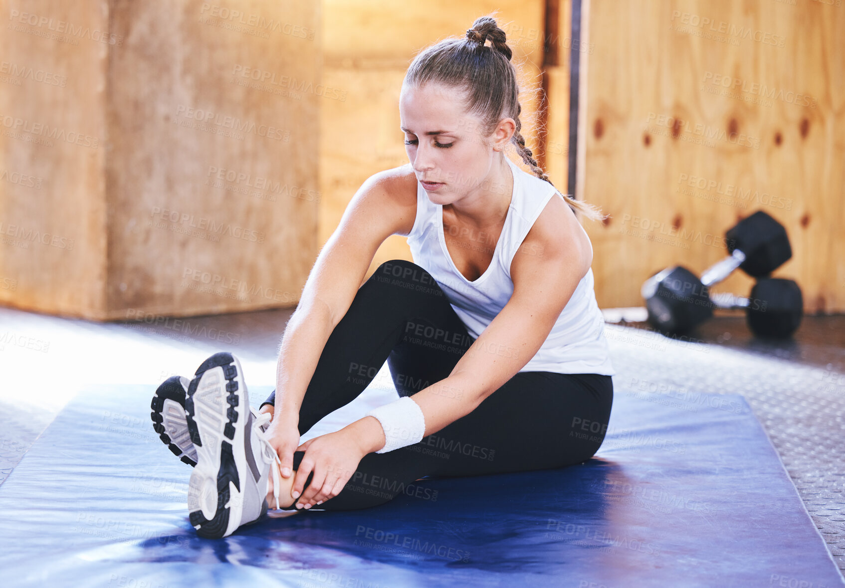 Buy stock photo Woman, massage and ankle pain of fitness at gym from workout injury, sports emergency and achilles problem. Female athlete, legs and accident from exercise training, joint risk and muscle trauma