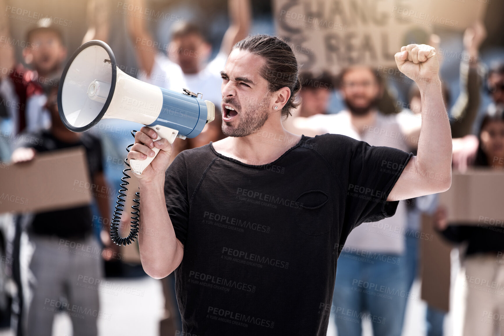 Buy stock photo Angry man, megaphone and protest with crowd for human rights, equality or change in society or city. Frustrated male person or activist screaming or yelling on loudspeaker in street riot or rally