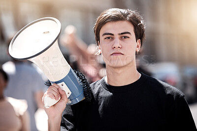 Buy stock photo Man, bullhorn and portrait in street for protest with demand, announcement or speech for peace. Person, megaphone and city with march for call to action with noise, news and human rights in New York