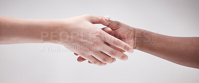 Buy stock photo Solidarity, agreement and people shaking hands for diversity, collaboration or respect for social support. Partnership, friends and handshake for peace deal, community connection and introduction.