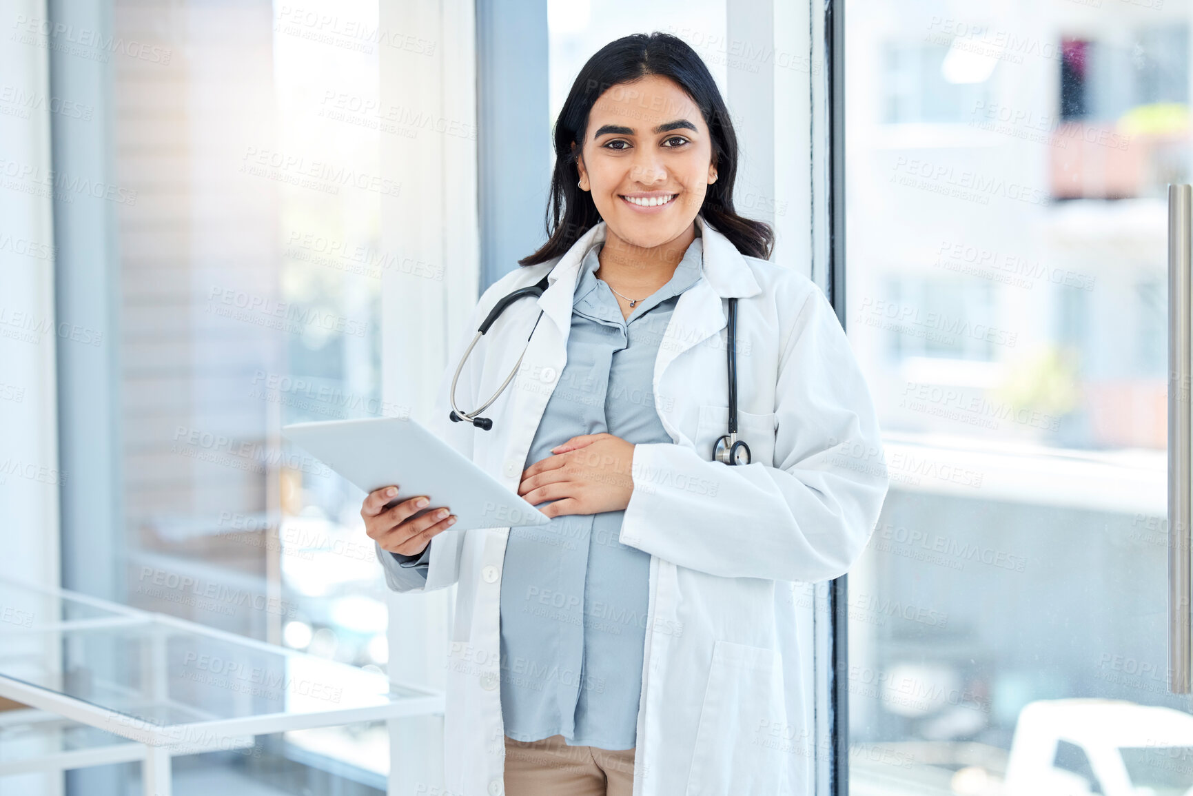 Buy stock photo Woman, pregnant doctor and tablet with smile, happy and online for lab results for patient. Medical, research or pregnancy of female person, medicine or internet for information on treatment