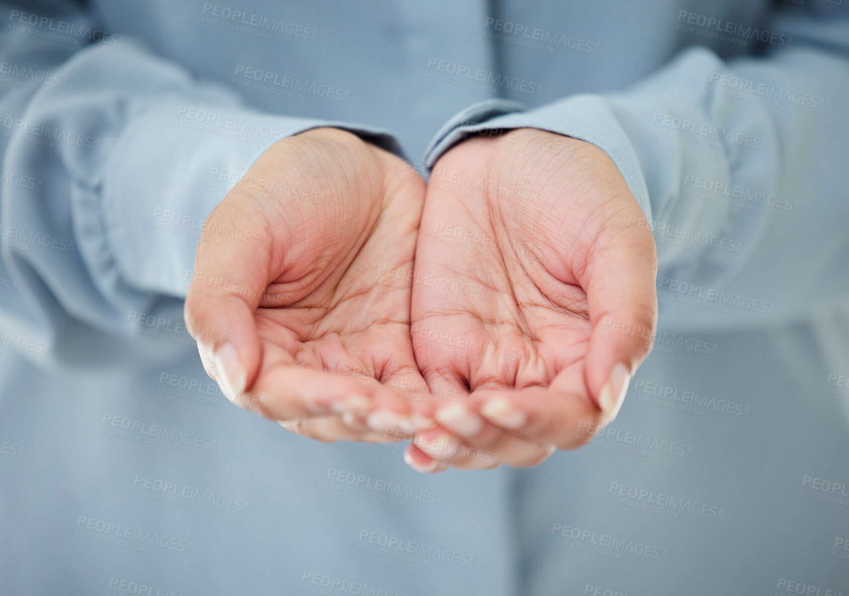 Buy stock photo Cropped shot of an unrecognizable businesswoman standing with her hands out in the office