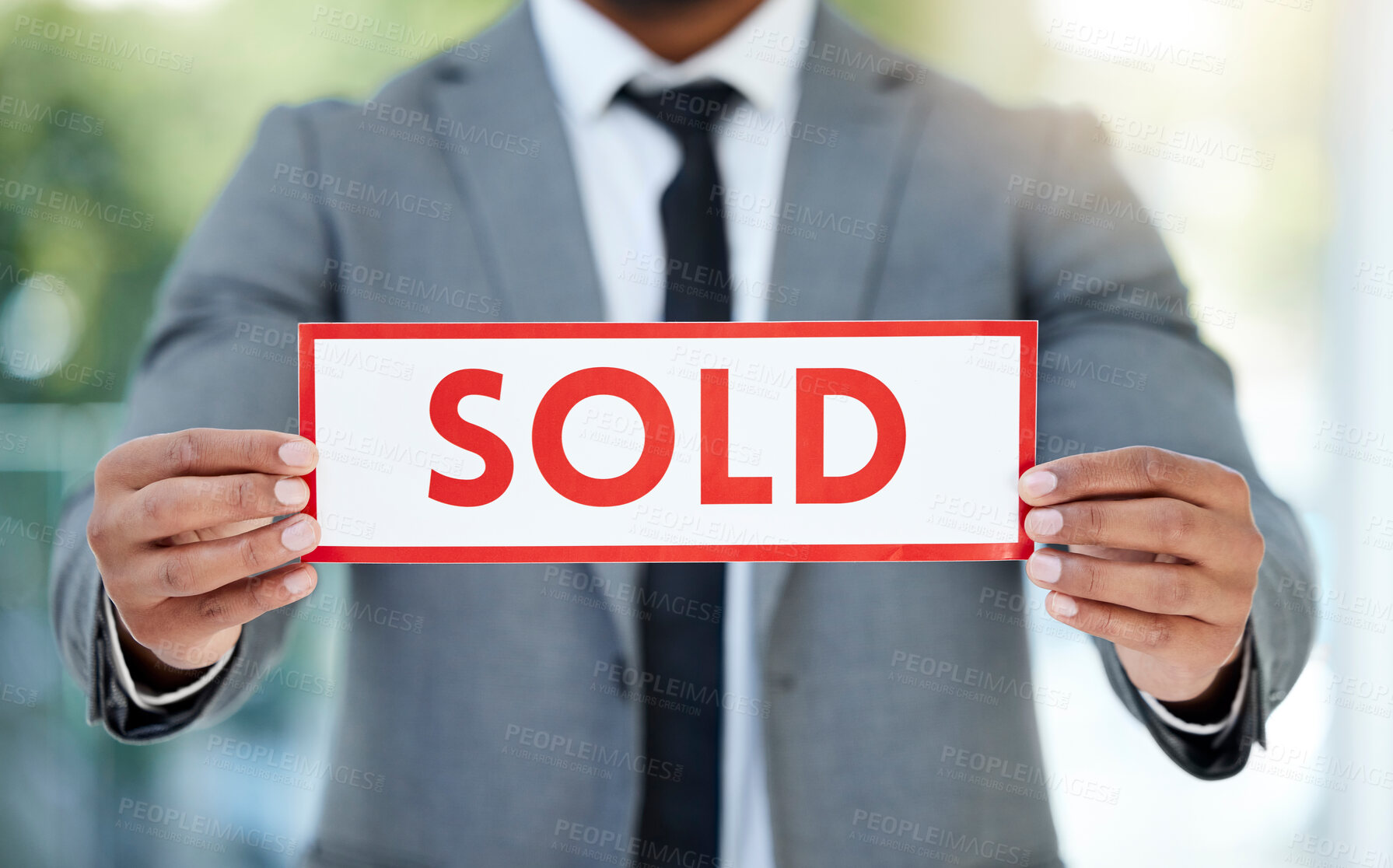 Buy stock photo Sold, sign and business person with success for announcement, notice or sales achievement. Office, real estate and broker with hands for board to display, info and communicate with poster to client