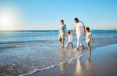 Buy stock photo Family travel, beach walking and holding hands with mother, father and kids at ocean on holiday. Vacation and parent care with mockup in summer outdoor with mom, dad and children by sea having fun