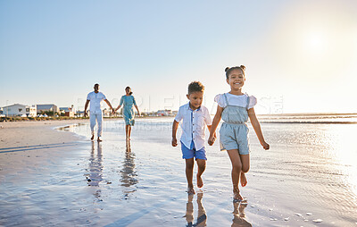 Buy stock photo Parents, siblings or children at beach for walking, holiday or travel on break with boy, girl or family. Excited, mom or father with kids at sea on vacation together for wellness or nature to relax