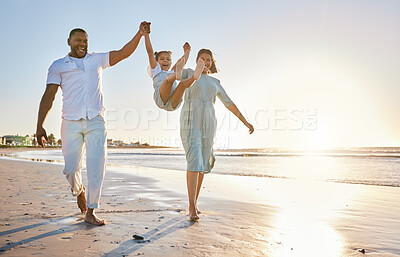 Buy stock photo Beach, parents and girl in portrait for swing, playful and bonding together on vacation holiday. Family, mother and father with child for security, connection and air game with happiness in ocean