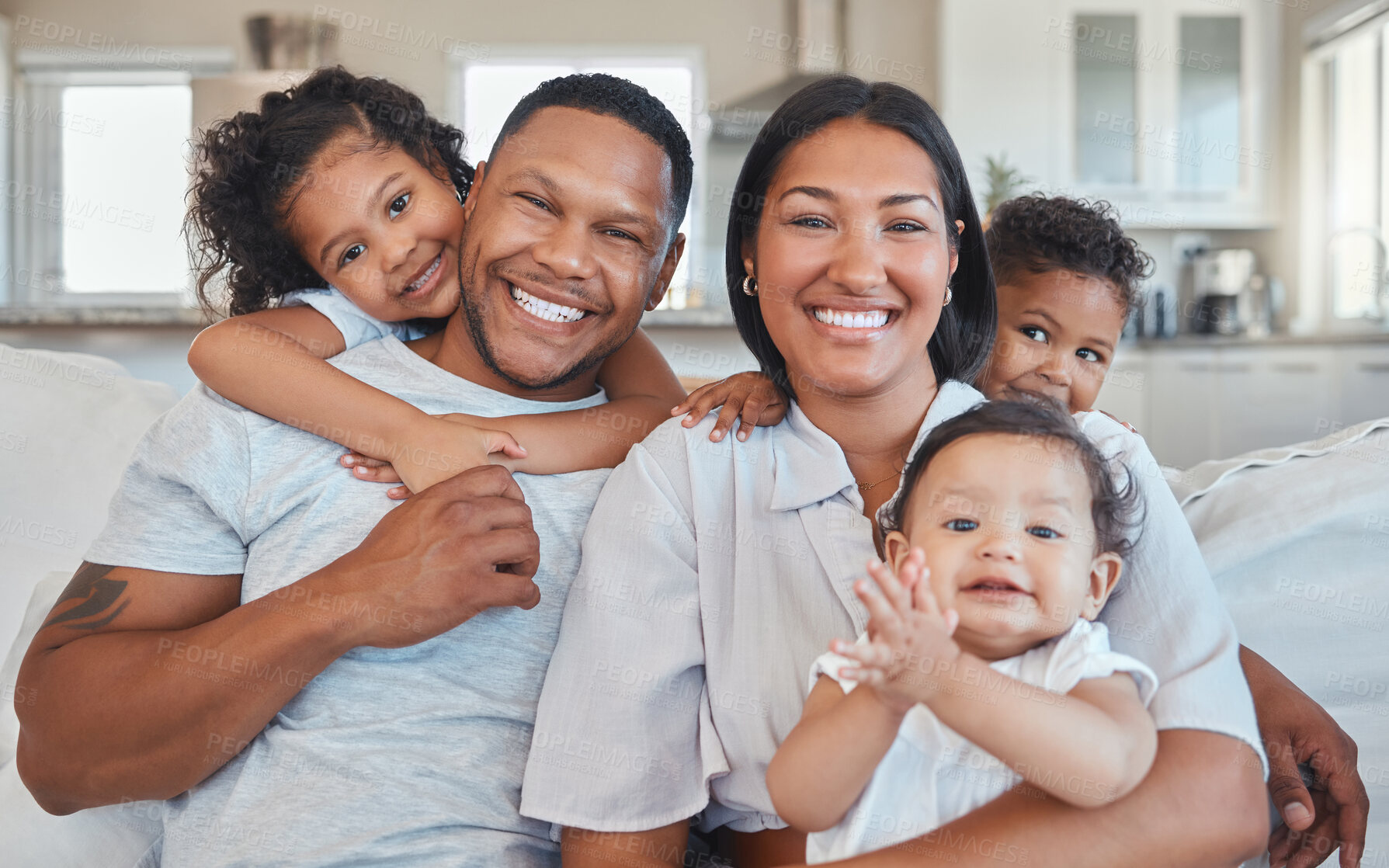 Buy stock photo Portrait, baby and children with happy family, smile or house to relax with security, safety and care. Mexico, faces or proud parents on sofa with kid, support and trust for bonding together in home