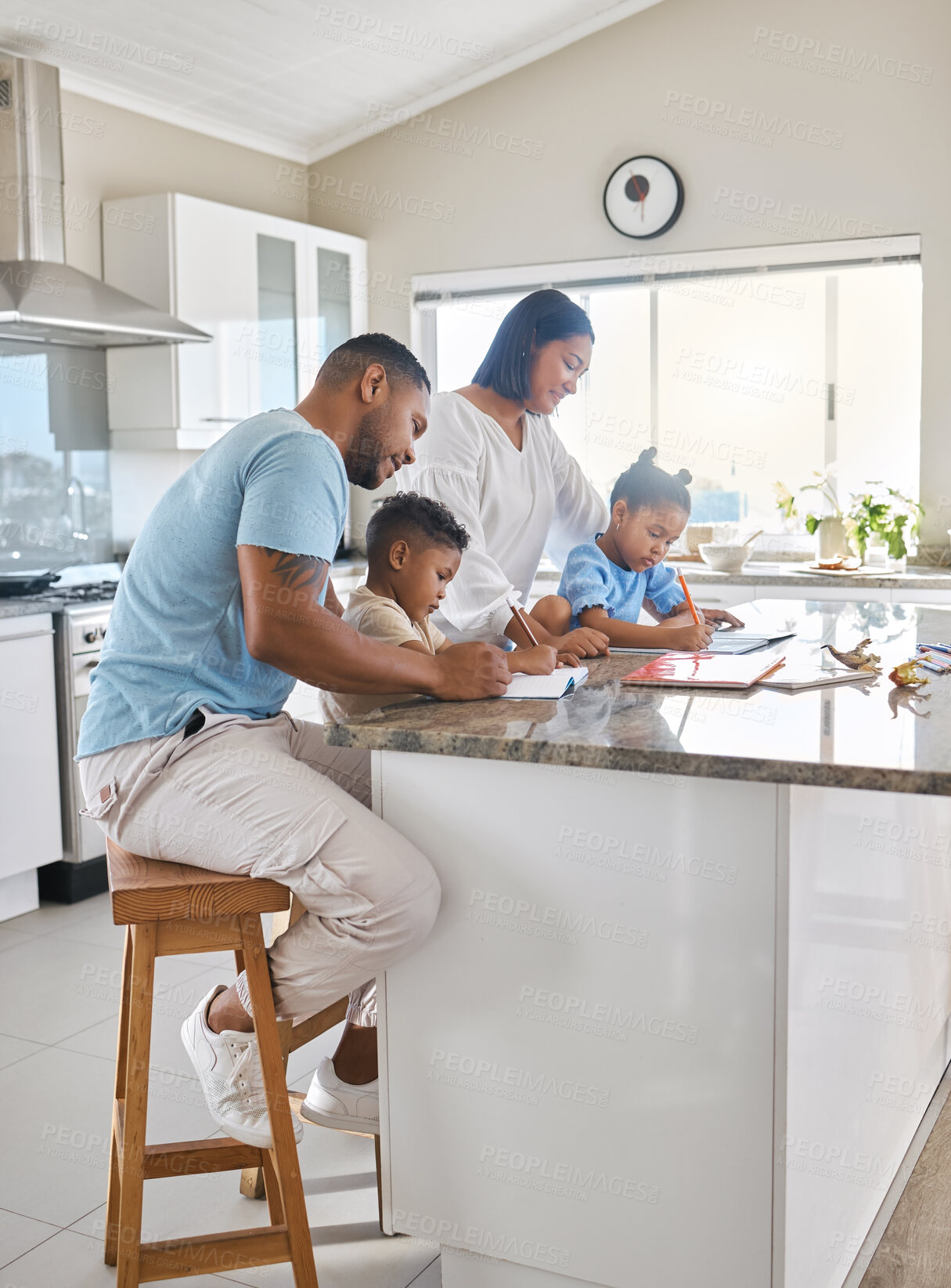 Buy stock photo Shot of parents helping their children with homework at home